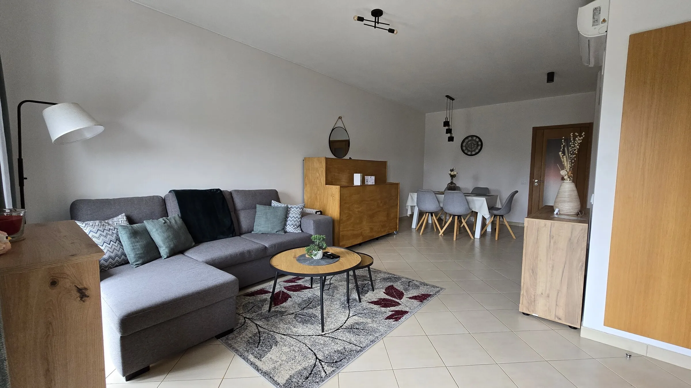 Comfortable grey sofa and lounge area