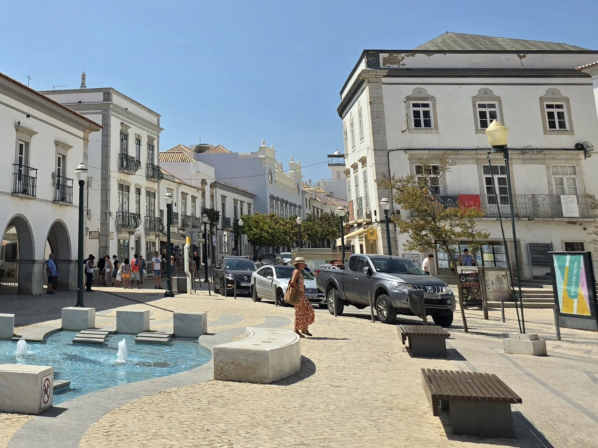A square in Tavira's old town with a fountain